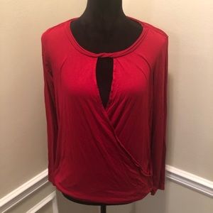 Long-sleeved red blouse, with a sexy neck line